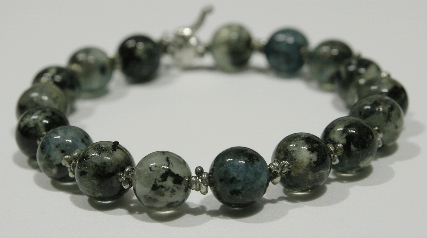 Water droplets on a semi-precious gemstone bracelet